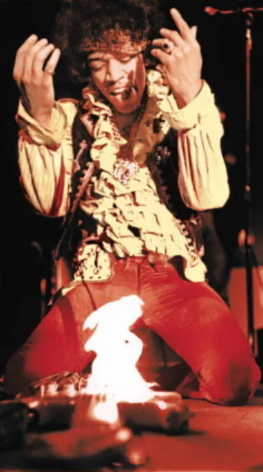 Jimi Hendrix burning his guitar at the Monterey Pop Festival June 18 1967