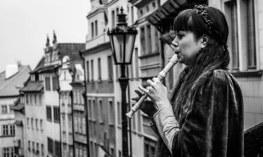 Woman playing recorder