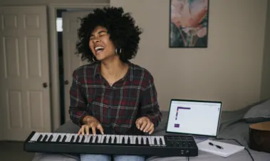 woman singing keyboard with confidence