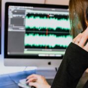 Female Music Producer using digital audio workstation DAW